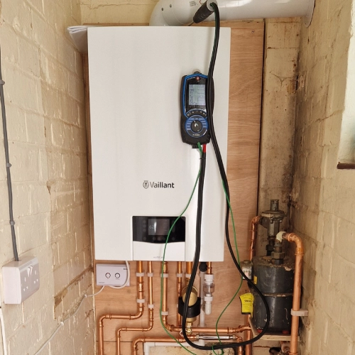 Engineer performing powerflush